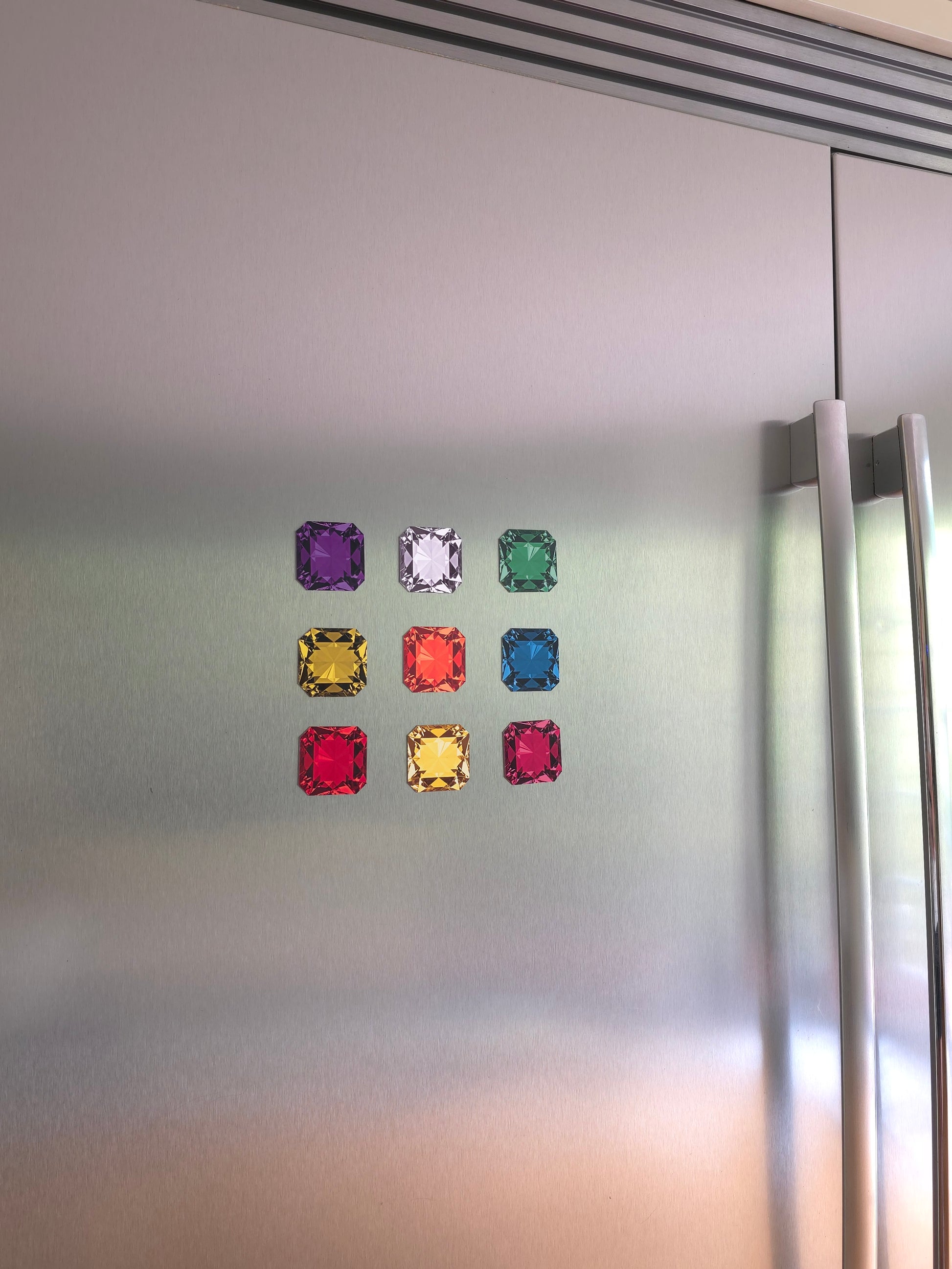 Colorful gemstone-style magnets — emerald cut in purple, clear, green, yellow, orange, blue, red, gold, and pink — luxury fridge and locker flaxible magnets 
Perfect bridesmaid shower gift
Goodies gifts 
Fridge jewelry 